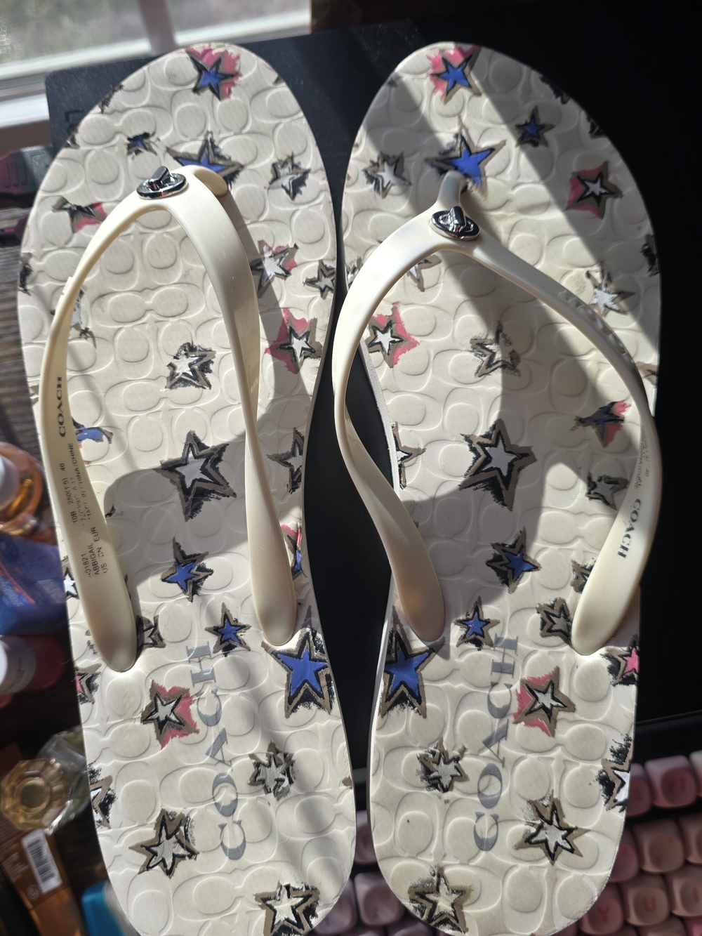 Coach Cream Star Print Flip Flop Sandals with Blue and Pink Accents
